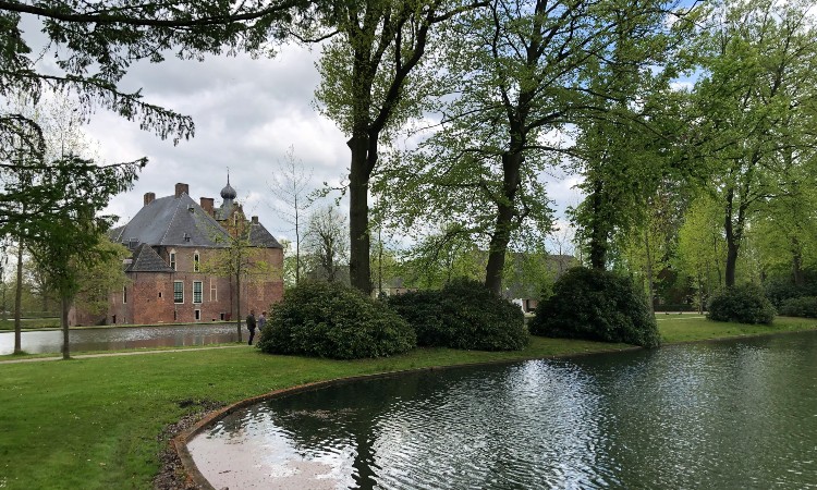 Netherlands landscape with building lake trees